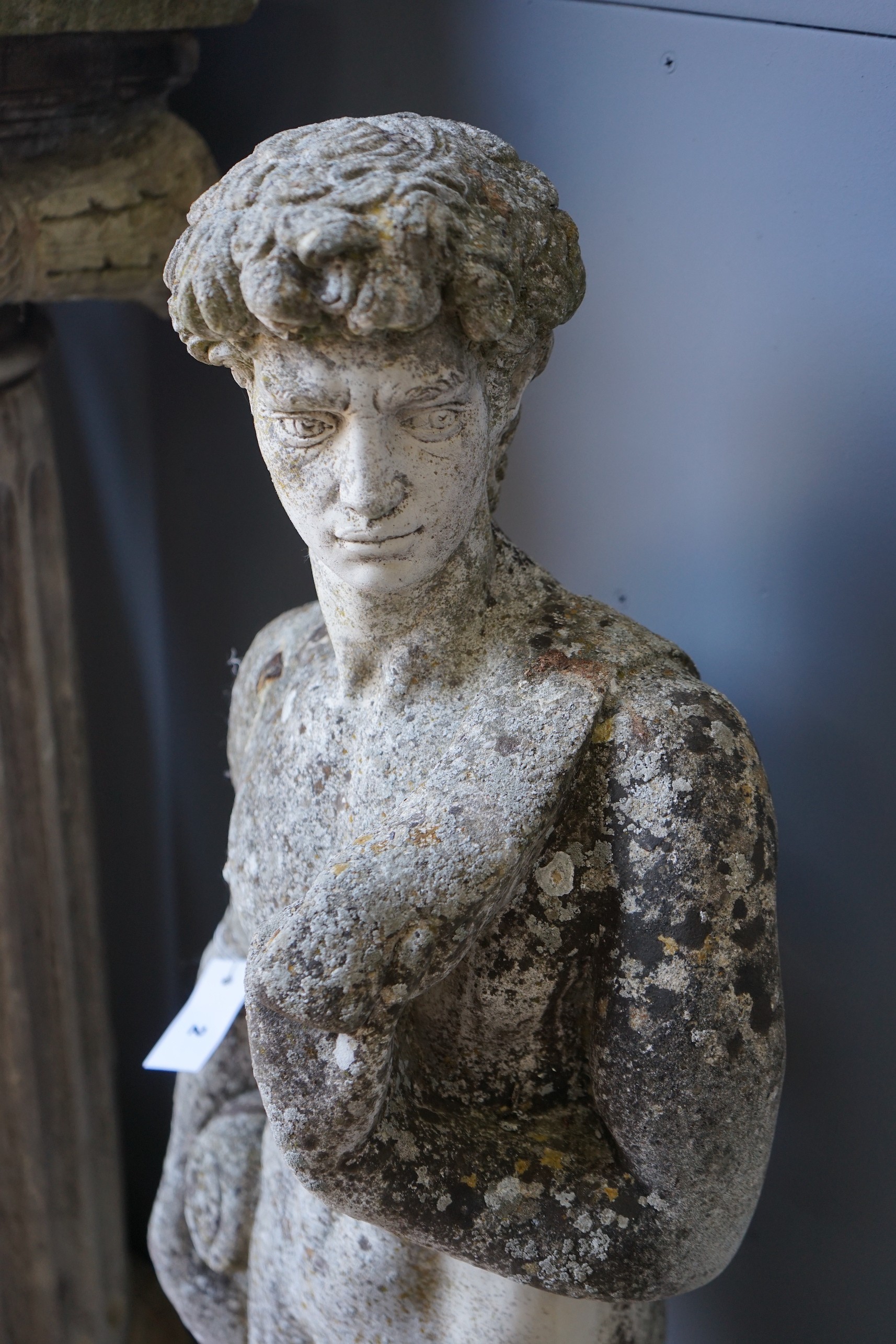 A reconstituted stone garden ornament of David, height 118cm